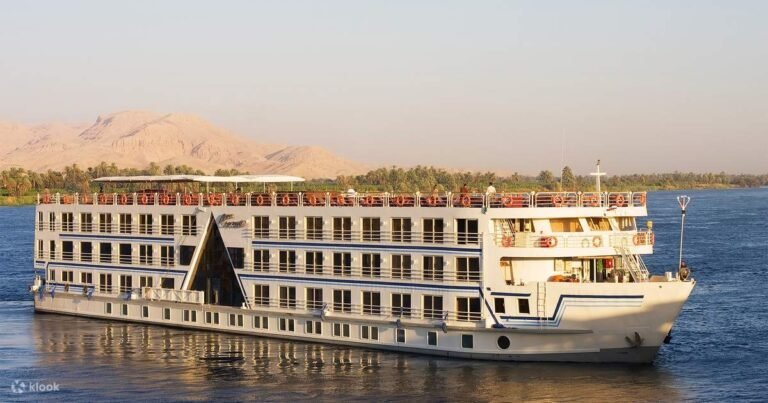 Nile cruise ship on the river at dusk