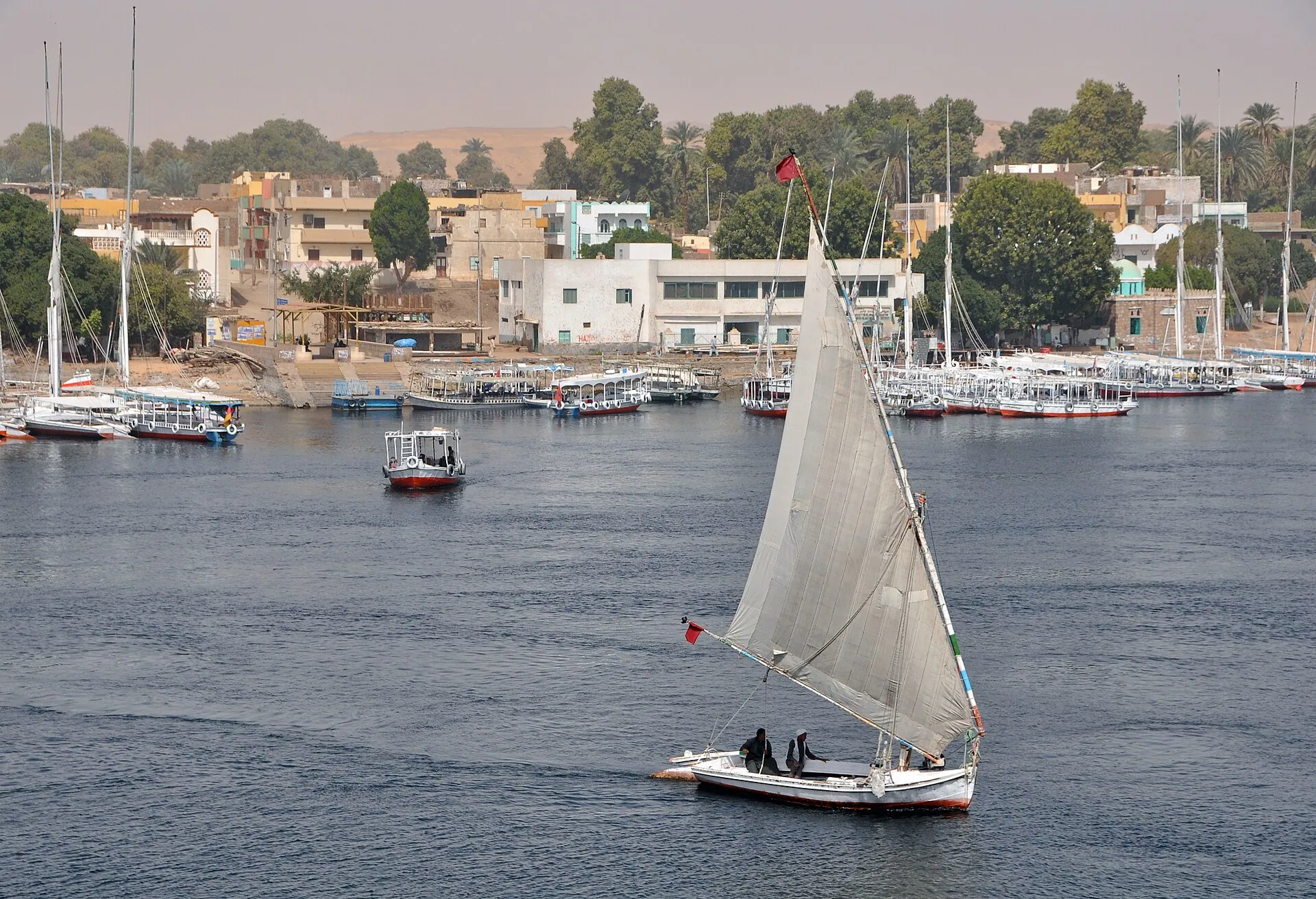 Felucca sailing past the Aswan riverfront